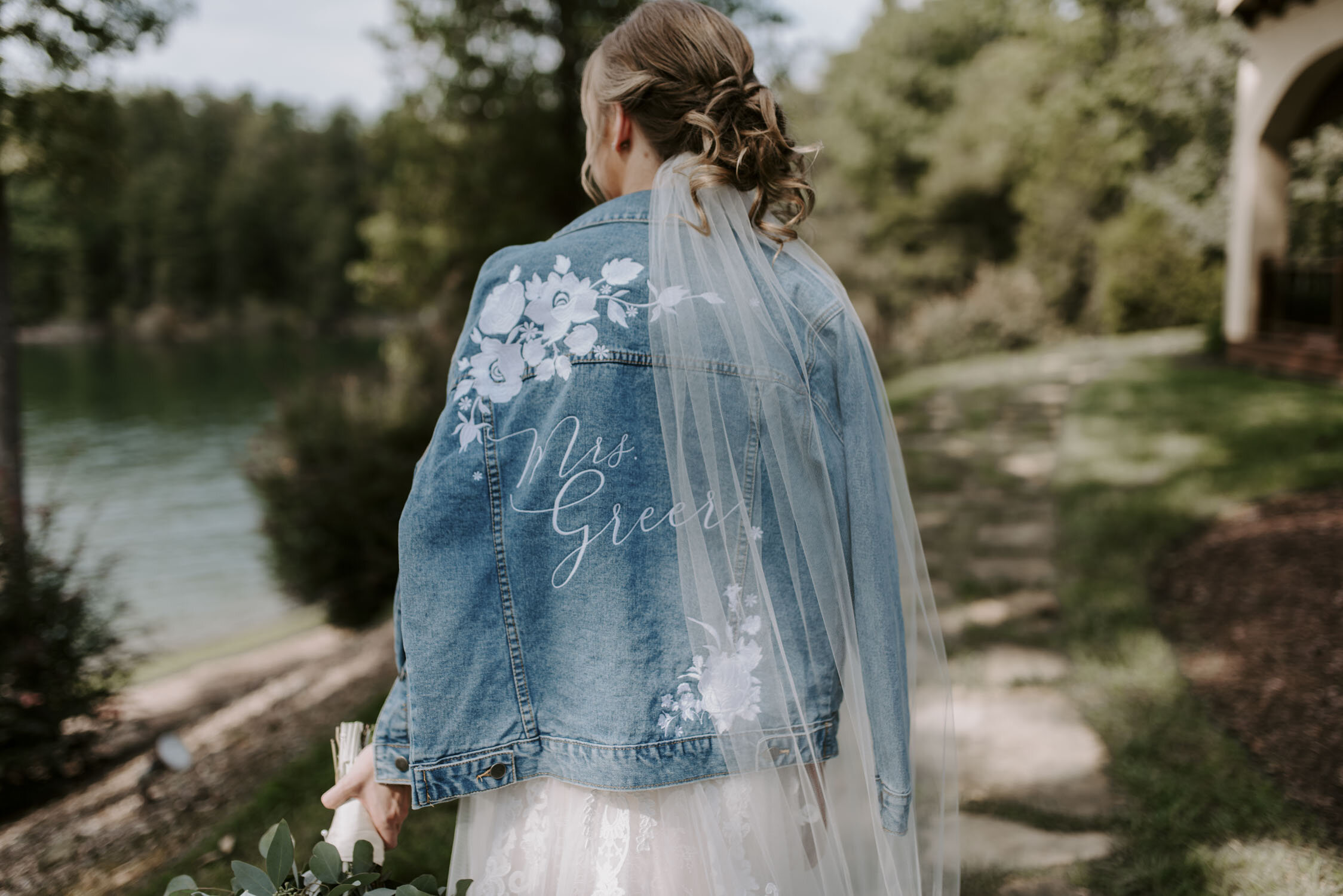 Romantic Bridal Portraits with denim jacket  at Bella Collina | By Greensboro, NC Wedding Photographer: Kayli LaFon Photography