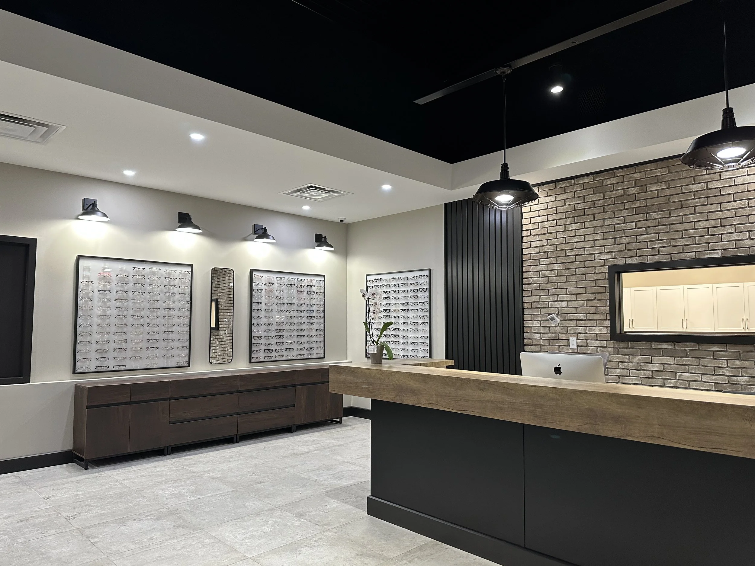 Frame board and glasses are displayed at the New store at Eye Deal Optical