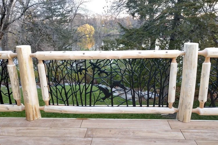 Log+Railing+with+Artistic+Metal+Insert+Soderlunds+Woodmill+Minnesota.jpg