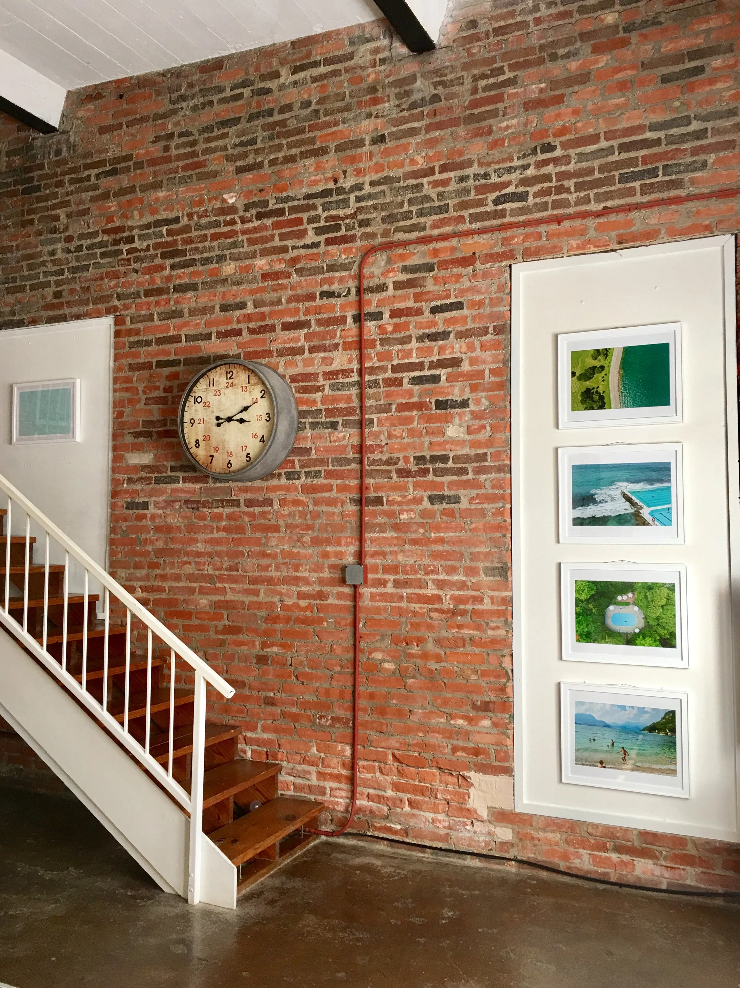 Belmont Harbor Aerial, Sydney Pool, WI Pool Aerial, Lake Como Kids - Susie's Dallas Loft. "Just wanted you to see your beautiful photography hanging in my loft. I LOVE how they turned out! All the best and safe travels to you both. I'm sure here real soon I'll get to say, I knew them before they were famous!😊"
