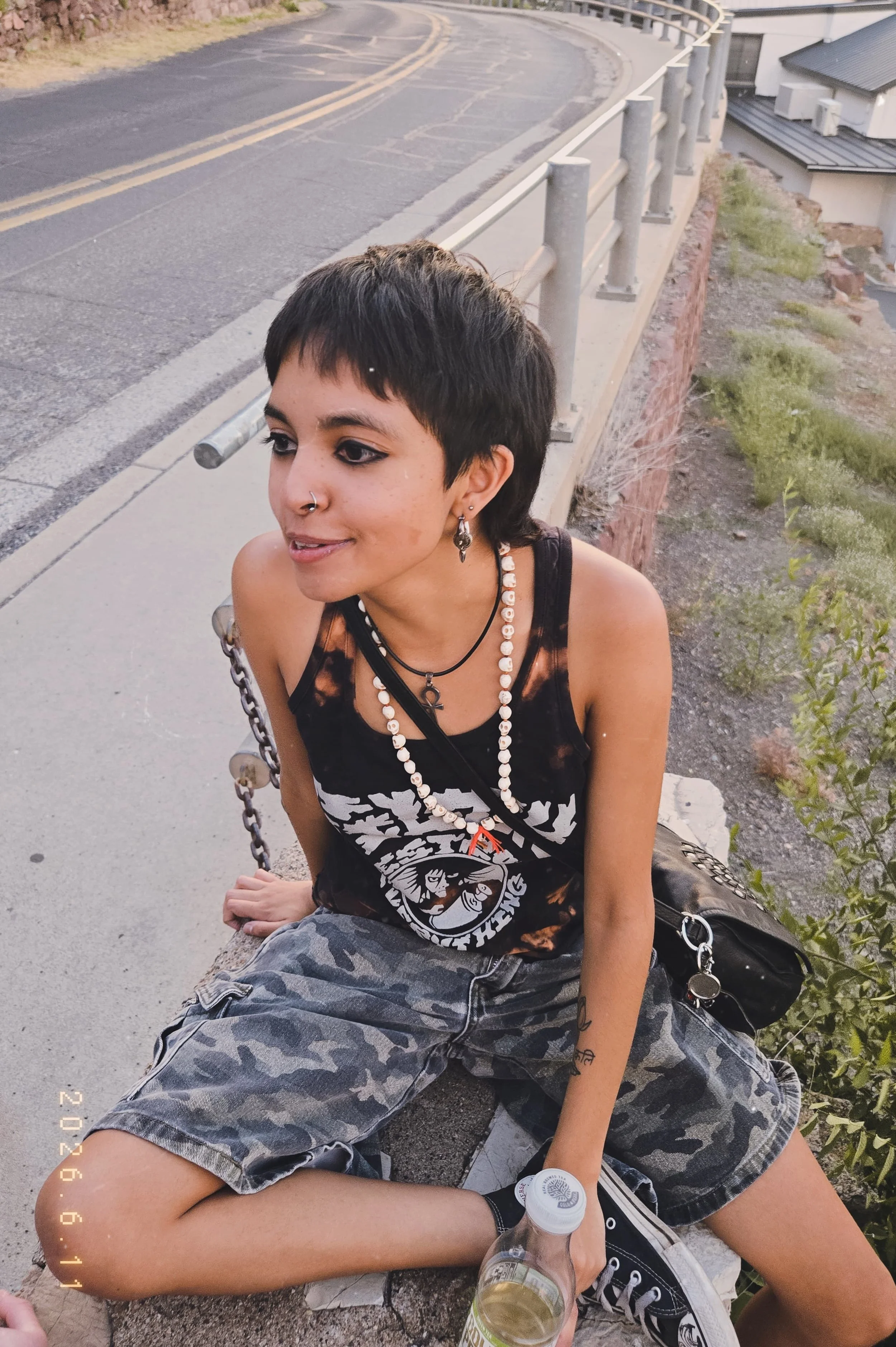 Aeka sitting on outdoor bench
