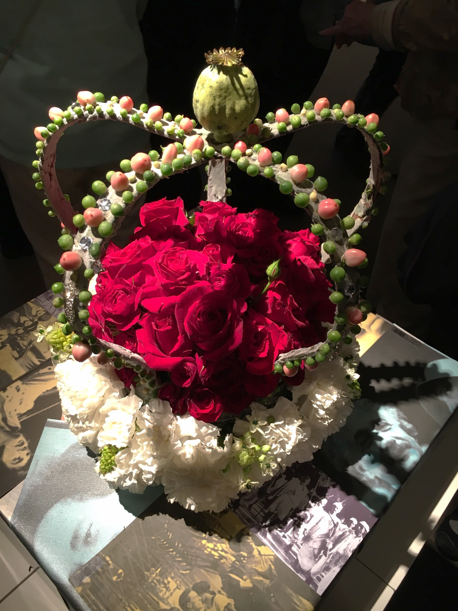 Those tiny green balls are from a strand of a "string of pearls" succulent! The florist was there with his piece, and many people were asking him questions about his work.