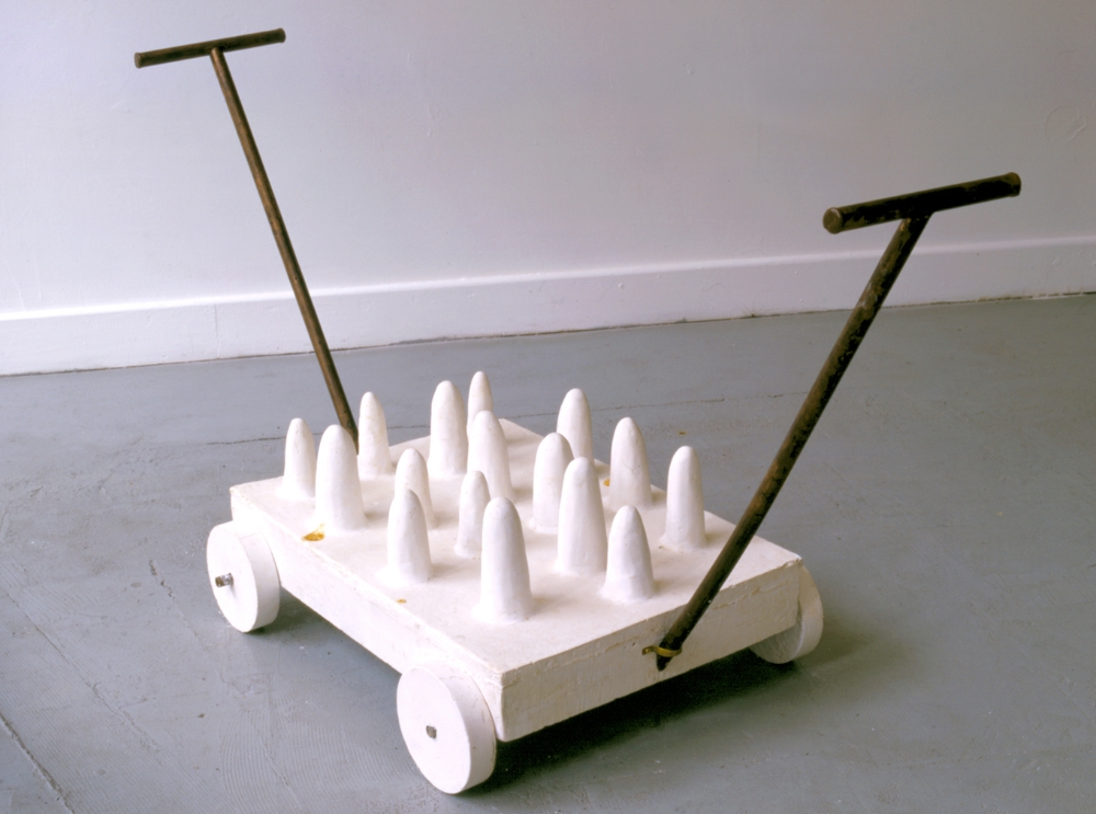 Futility Cart , 1999 Cast hyrdrastone and copper 12 x 32 x 32 in. (30.48 x 81.28 x 81.28 cm)