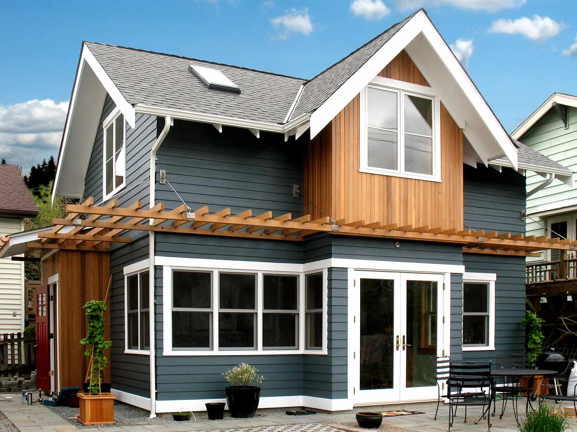 This backyard cottage is 800 sf, 2 bedroom, 1 1/2 bath cottage and builds on the character of the original house. Best Small House, FineHomebuilding 2012