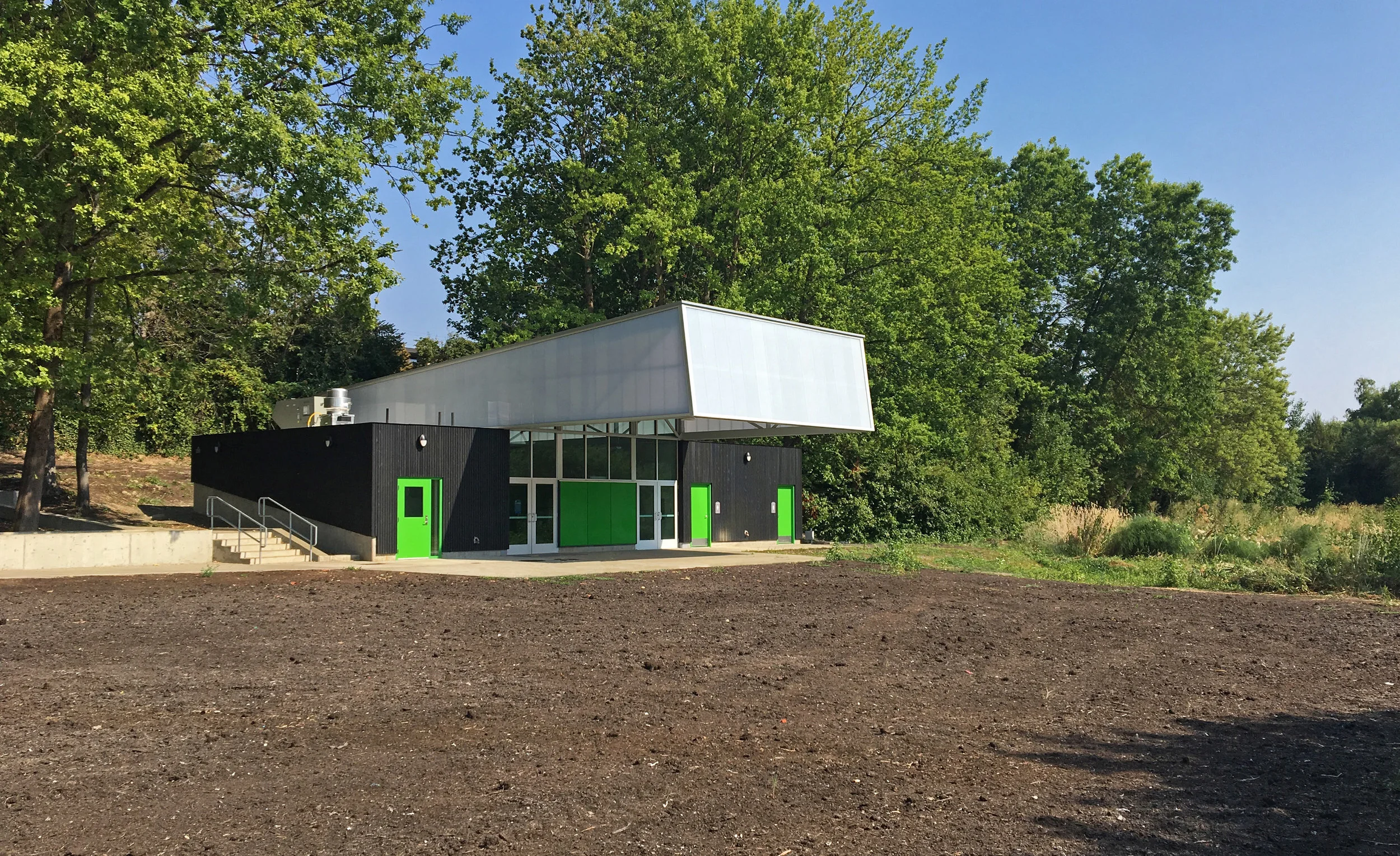 The RBUFW Education Building is a multi-use space that combines classroom and community gathering space, a large demonstration kitchen as well as production and storage space for processing of produce harvested on site.