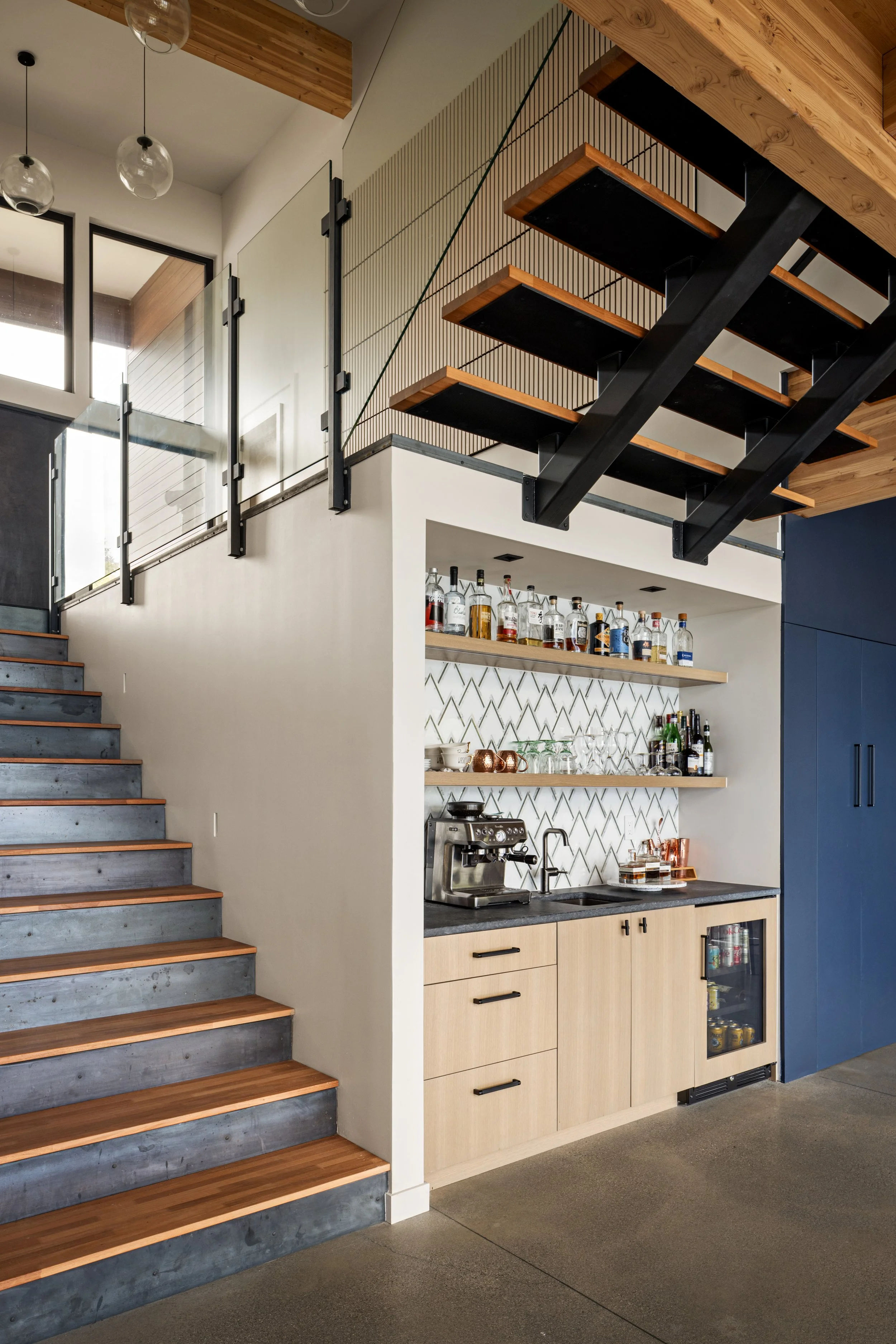 Whisky Jack, double height atrium, built-in bar, stair