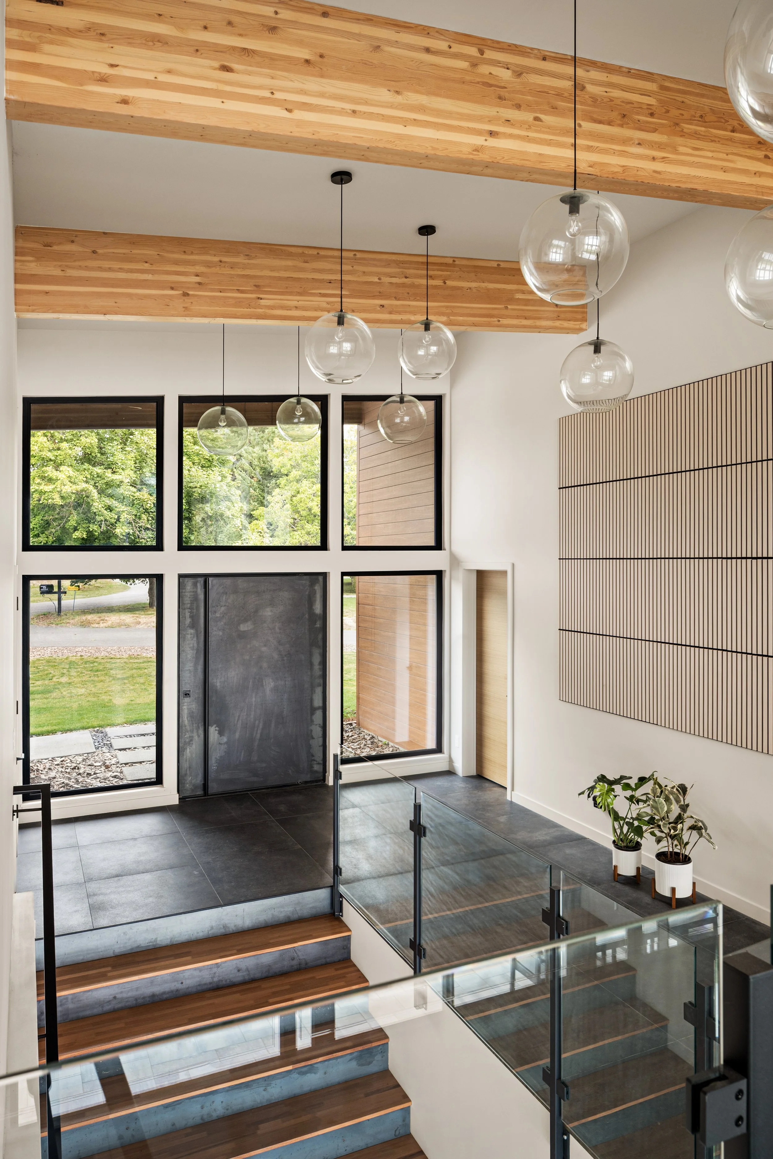 Whisky Jack Residence, entry, double-height atrium, stair