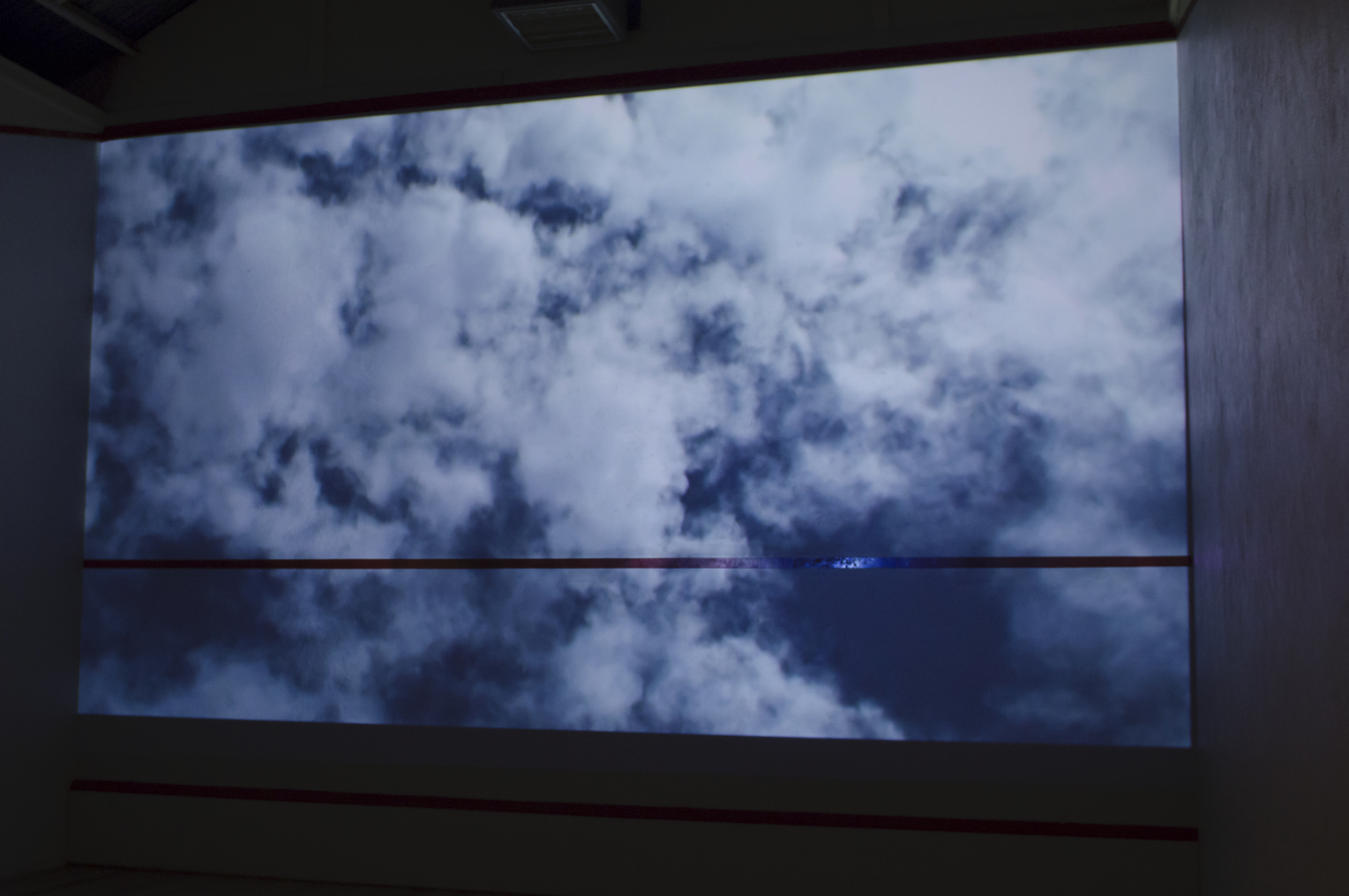 Traverse , 2015 (installation detail) Single Channel video 01:11; vinyl wallpaper, 3000mm diameter; chromogenic print/photo collage on plywood 1100mm diameter Inland Residency Program Mildura Palimpsest Biennale #10 2015