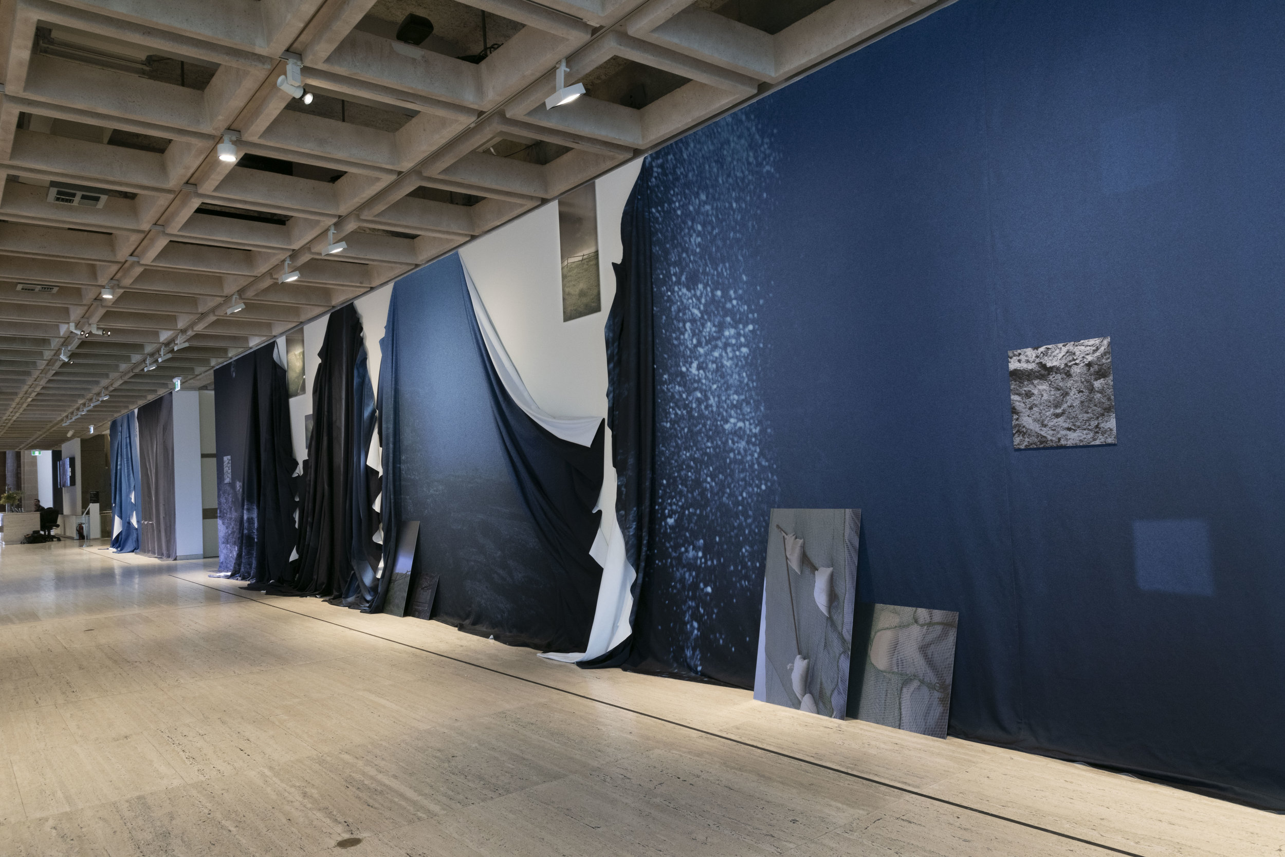    Apparent distance   2019  dye-sublimation prints on fabric and photographic prints on aluminium  340 x 850 cm, 340 x 2059 cm  installation view 