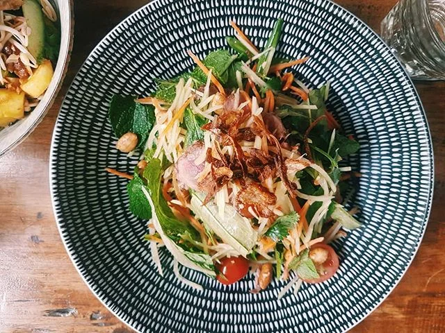 Let's not forget about this crowd pleaser as well... PAPAYA SALAD 
Fresh green papaya, young carrots, long beans, cherry tomatoes, Vietnamese mint, coriander, peanuts, hot &amp; sour Nahm Jim and crispy shallots with the option to add chicken or beef