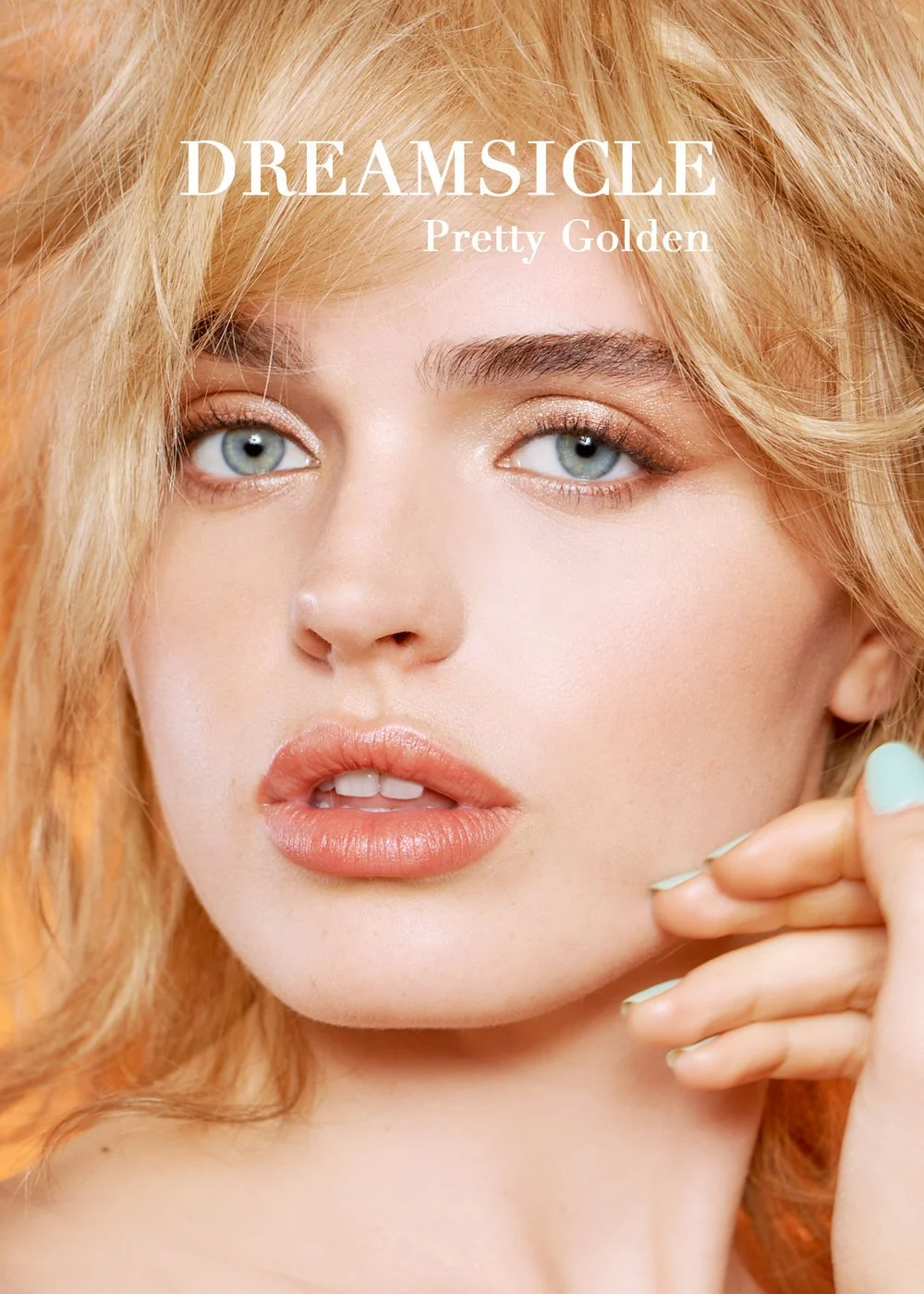 Commercial cosmetic photography for Senna Cosmetics by Daniella Hehmann, expert beauty photographer in Los Angeles and Munich. Model showcasing "Dreamsicle" peach-toned makeup by Eugenia Weston. Luminous, soft-focus studio lighting highlights a radia