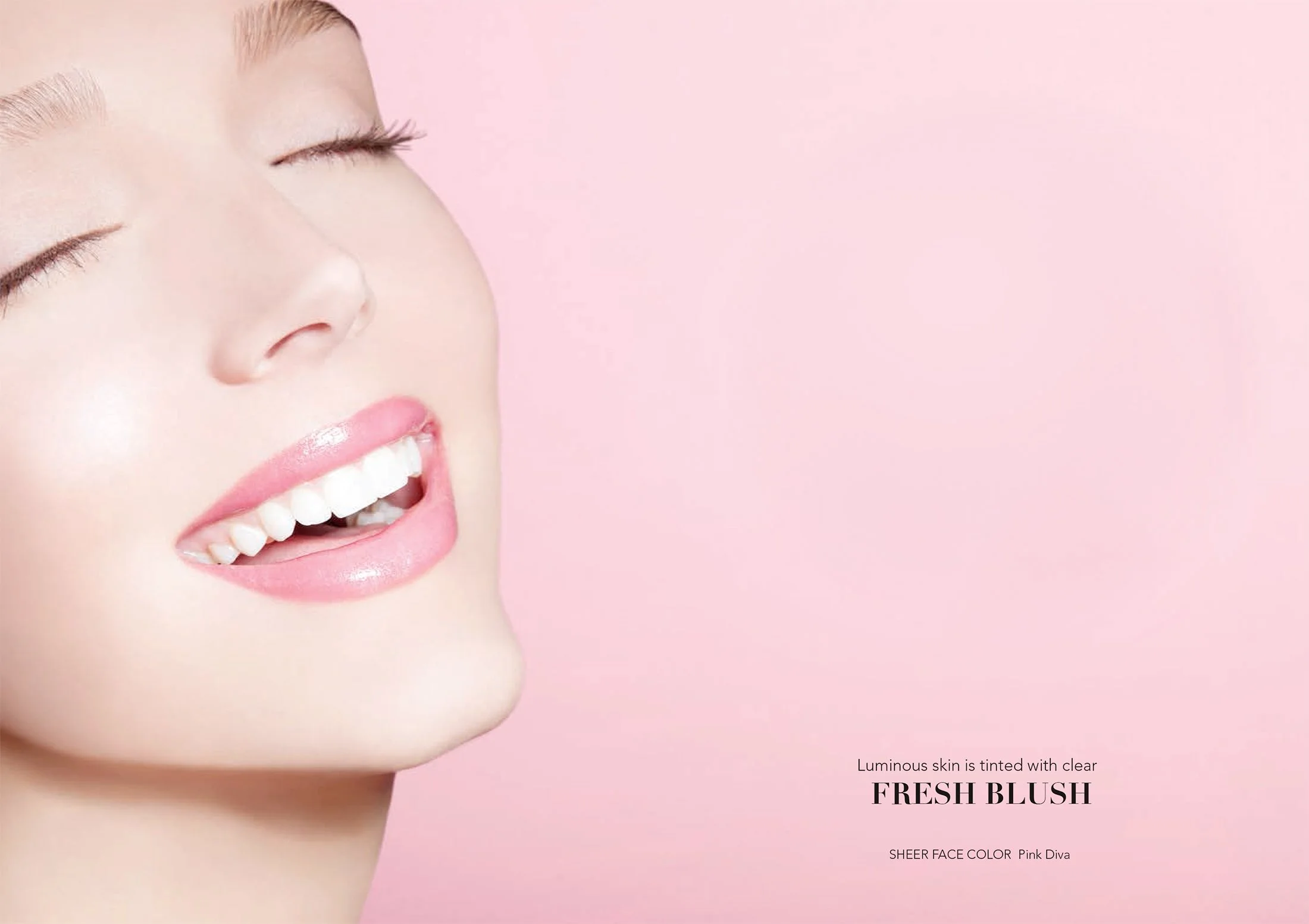 Vibrant "Fresh Blush" beauty campaign for Senna Cosmetics by Los Angeles beauty photographer Daniella Hehmann. Model laughing with warm-toned makeup by Eugenia Weston. Soft, wrap-around studio lighting accentuates a joyous expression and natural skin