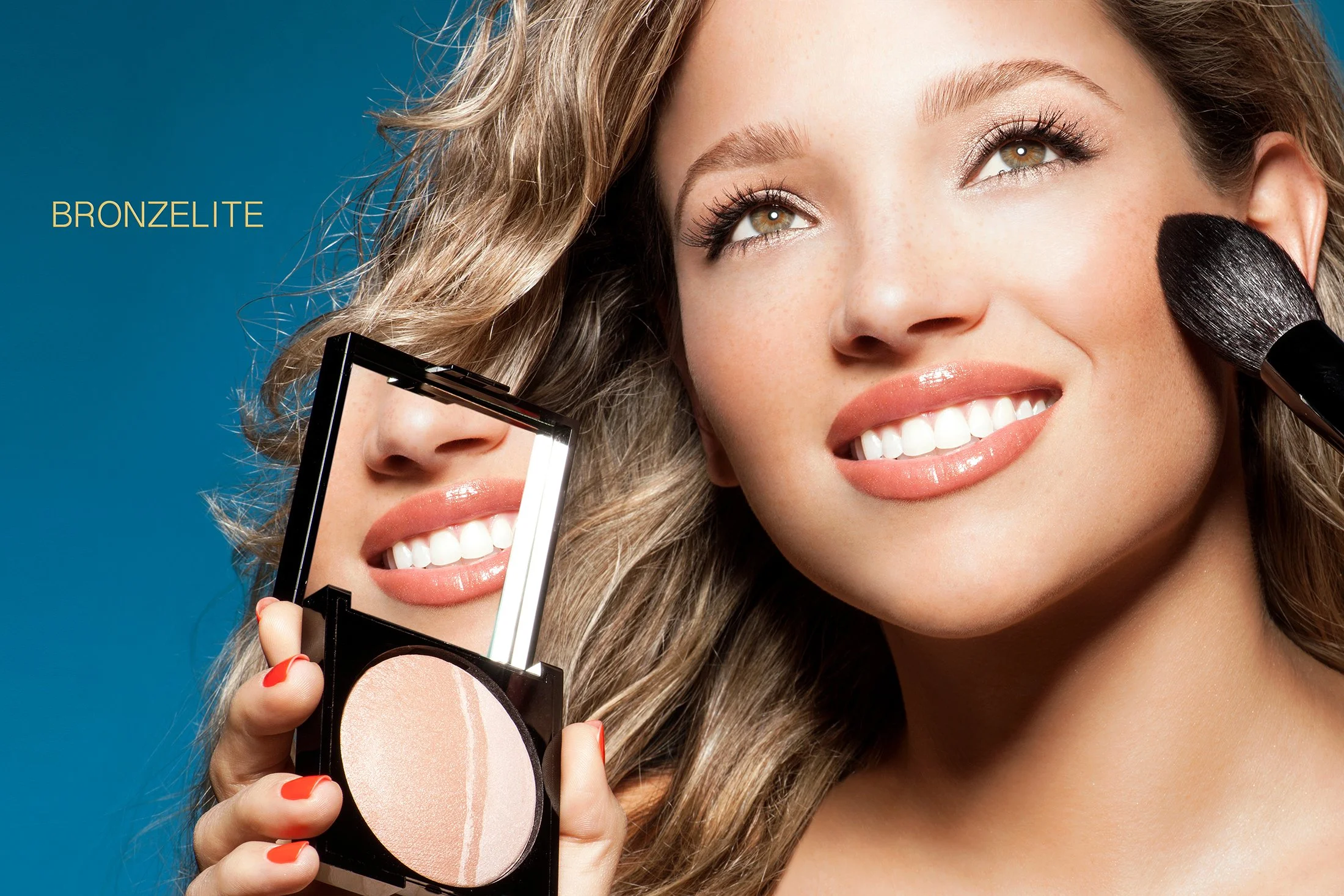 Professional beauty advertising for Senna Cosmetics "Bronzelite" campaign by Los Angeles beauty photographer Daniella Hehmann. Featuring makeup by Eugenia Weston, the shot showcases sun-kissed, glowing skin and warm bronze tones. Captured with bright