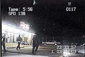 The two officers are now chasing the suspect. He could have stopped and raised his hands at any time.