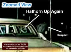 The suspect has broken away from the other officer. Hathorn rises up.