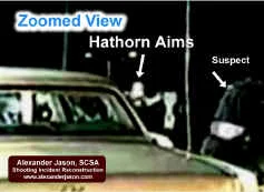 Hathorn is standing again, aiming and firing as the suspect moves away.