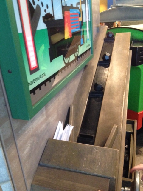 The coal goes up the conveyor belt and Percy gives a big CHOO CHOO! 