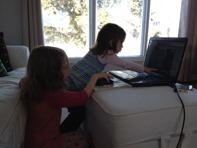 My oldest helping her little sister with the interactive episode