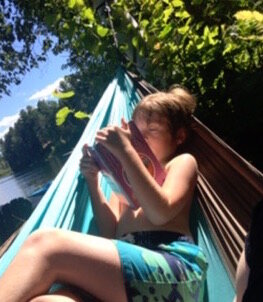 Reading in a hammock