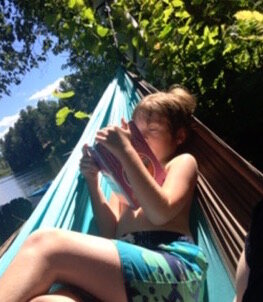 Reading in a hammock