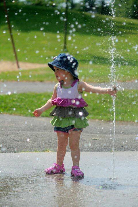 Toddler at a splash pad