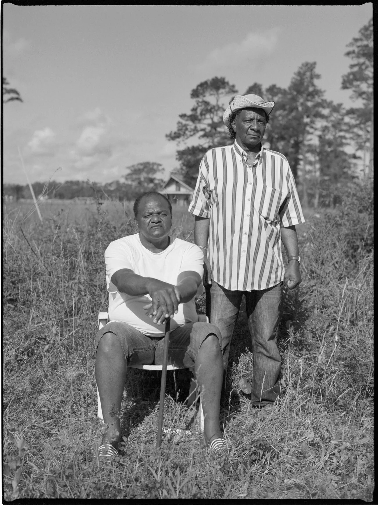Licurtis Reels, left, and Melvin Davis, right, on Silver Dollar Road. Photograph by Al J. Thompson for The New Yorker