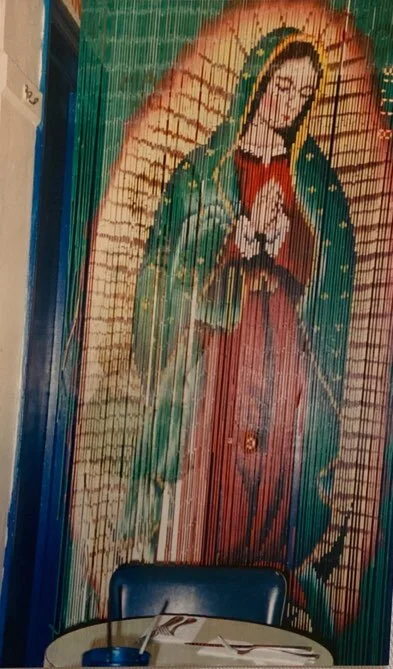 Virgin Mary beaded curtain at my abuela’s house in Harlem