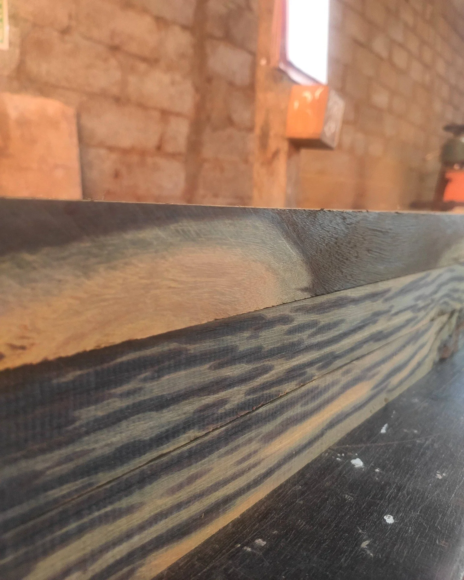 The Story Written in Grain 🌿

Each line, each swirl, each knot &mdash;
a trace of time etched into Borneo Ironwood.
Once part of bridges, docks, and old homes,
these boards now breathe a new life,
their grain carrying whispers of rain, sun, and wind