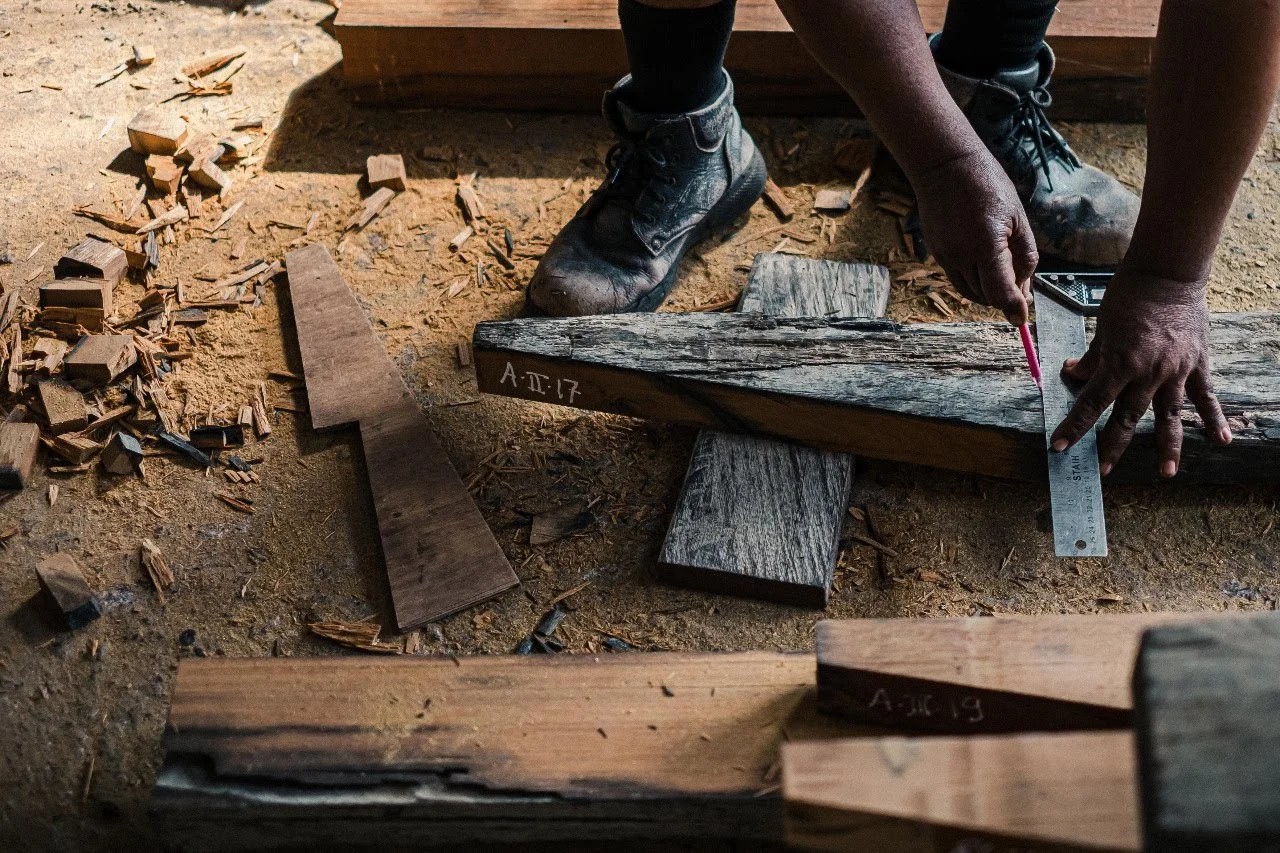 Before reclaimed ironwood becomes decking or flooring, it starts here.

Measured by hand, checked piece by piece, and reshaped with care &mdash; this is the quiet part of the process where patience matters more than speed. Every mark, every cut, ever