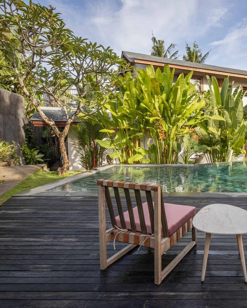 The best outdoor spaces don&rsquo;t compete with their surroundings.

They settle into them.

Here, reclaimed ironwood creates a dark, tactile foundation for the pool and tropical landscape &mdash; letting the greenery, water and architecture take th