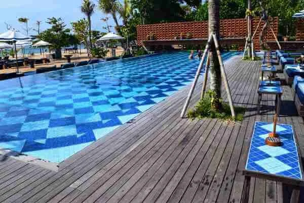 Reclaimed Ulin pool decking at a luxury beach club in Bali