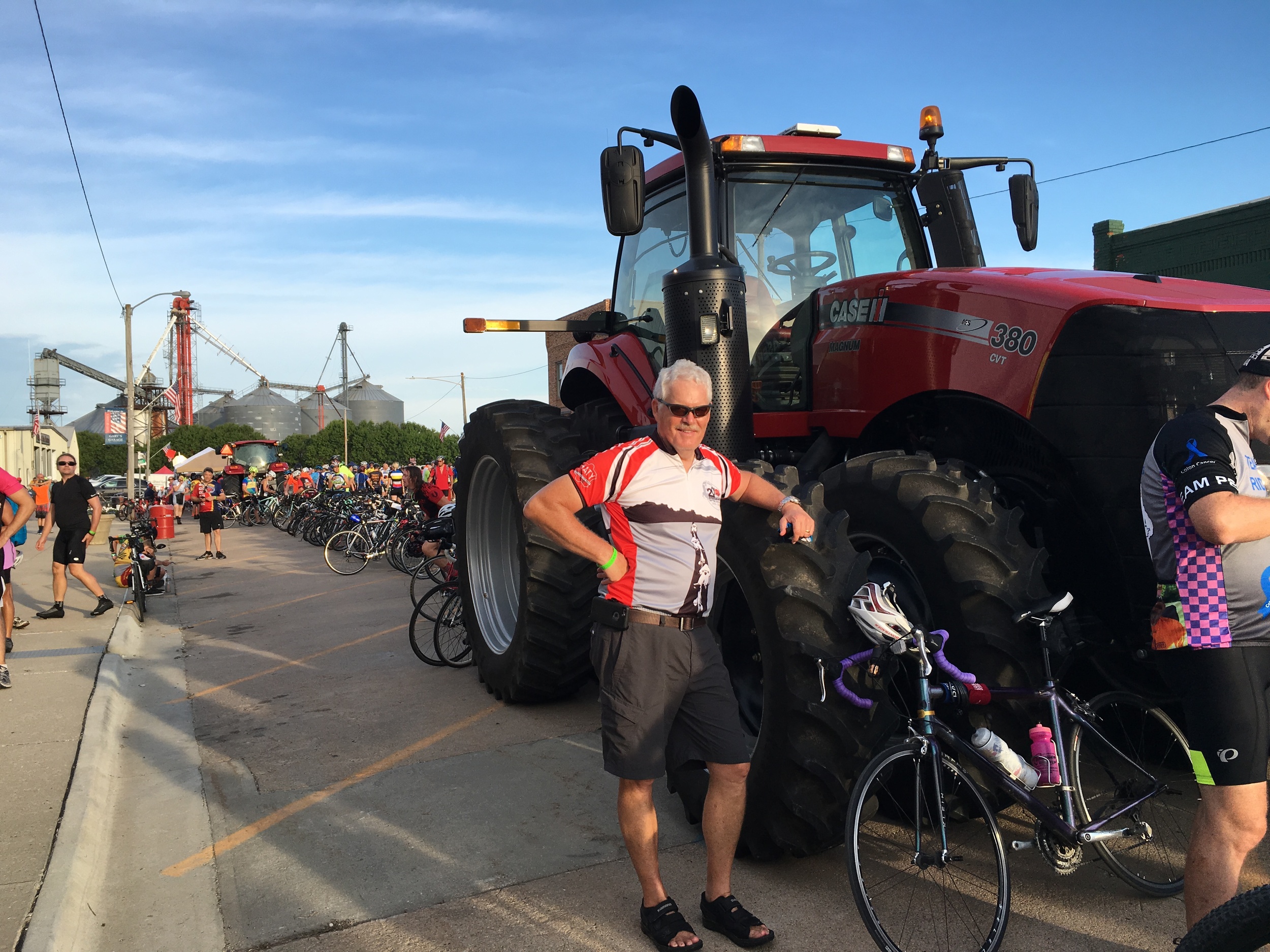 Paul at Breakfast stop beside a tractor