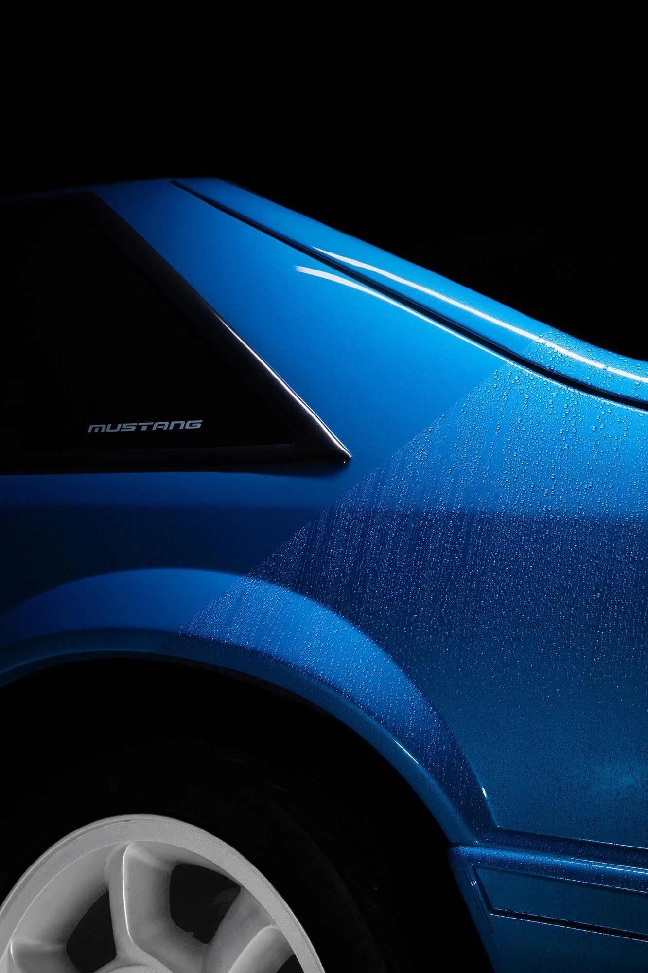 close mustang rear quarter split smaller.jpg