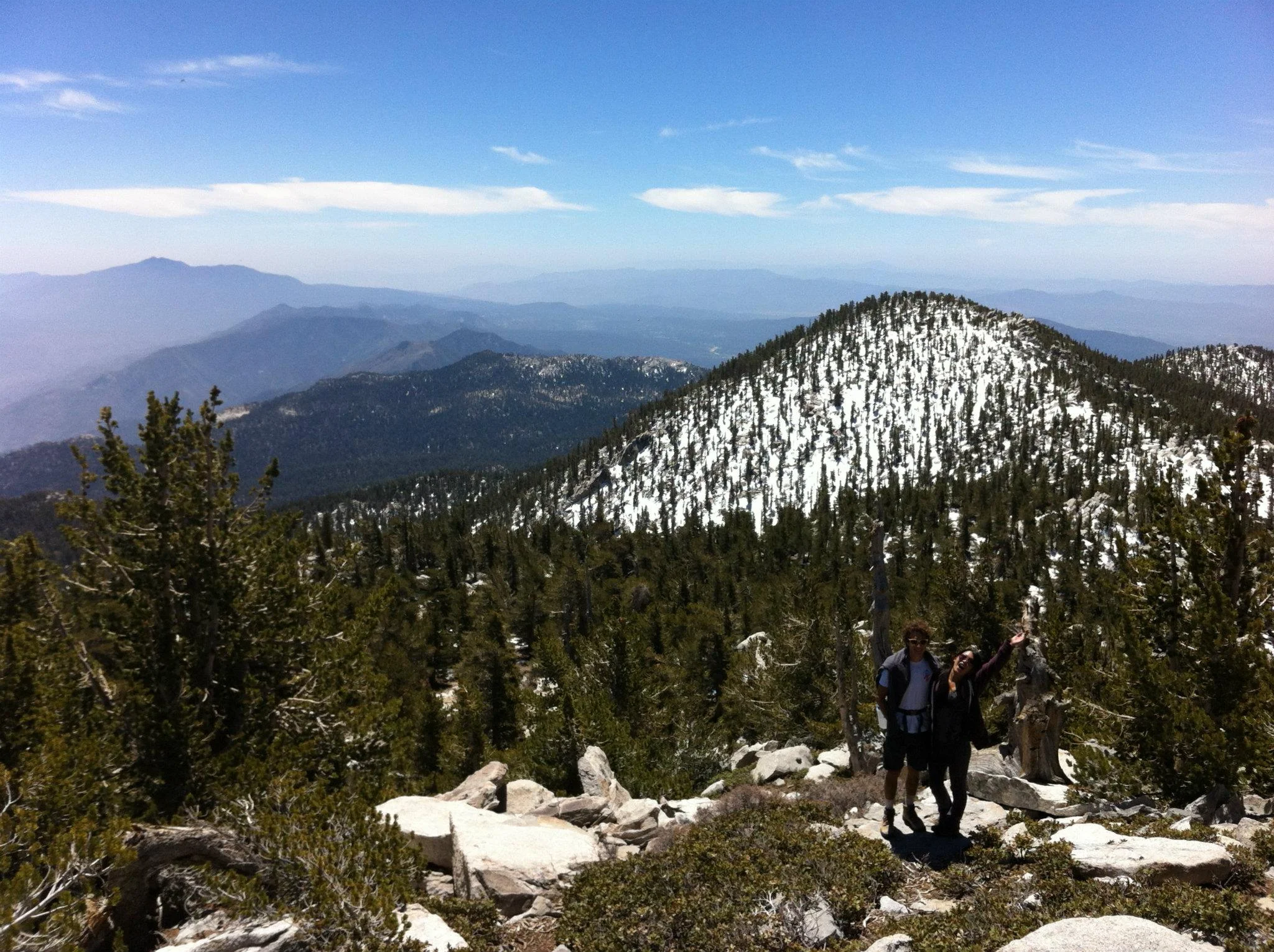 Overlooking the beautiful mountain views from the peak