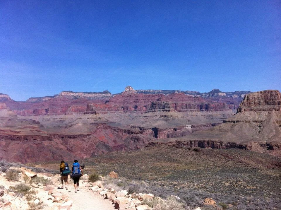 The top of the canyon walls slowly rose above us