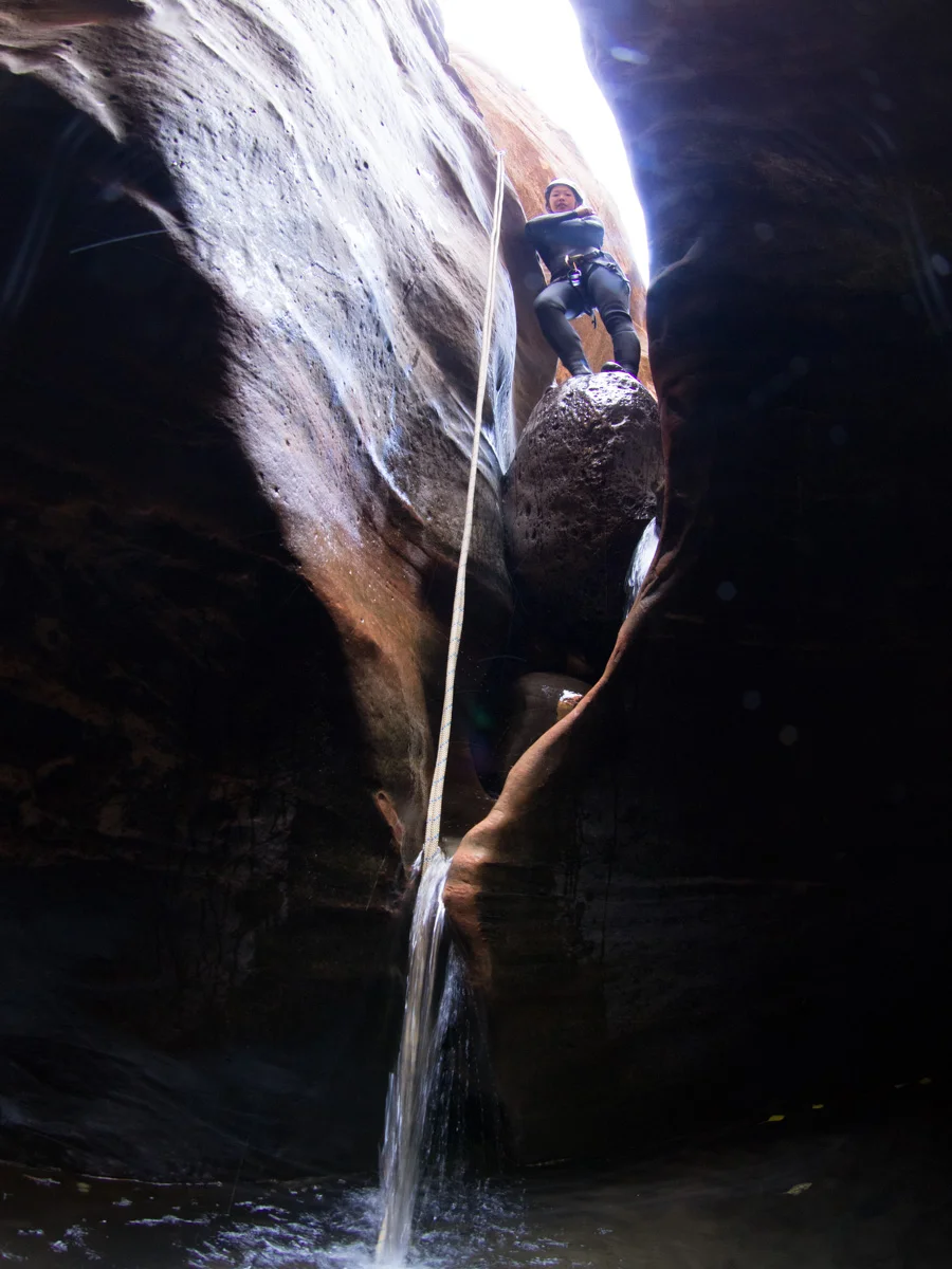 Short rappel down the waterfall in October