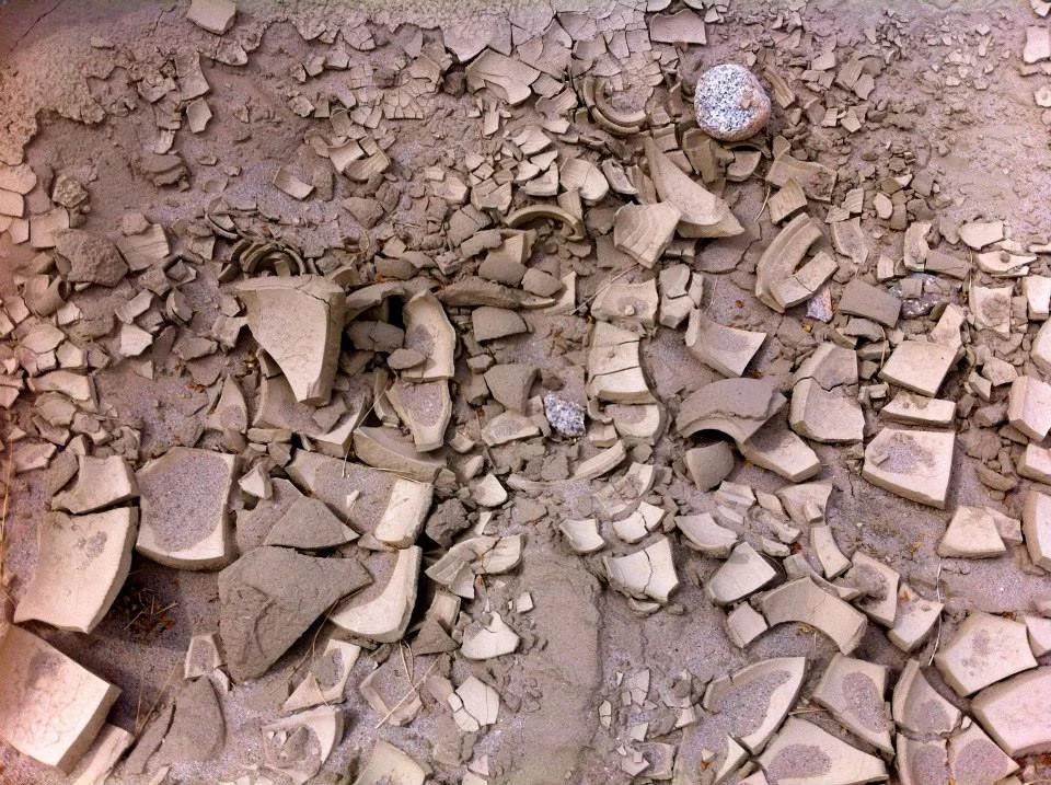 Dried mud shards that crunched under our boots