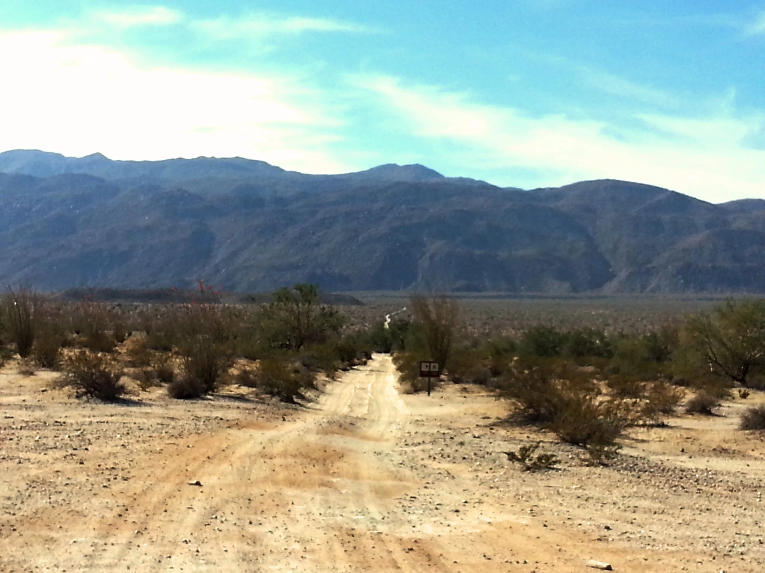 The dirt road with hidden rocks, bumps, and obstacles