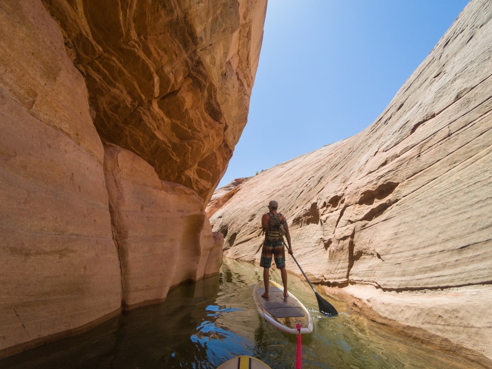 Slot canyon stand up paddleboarding in Utah