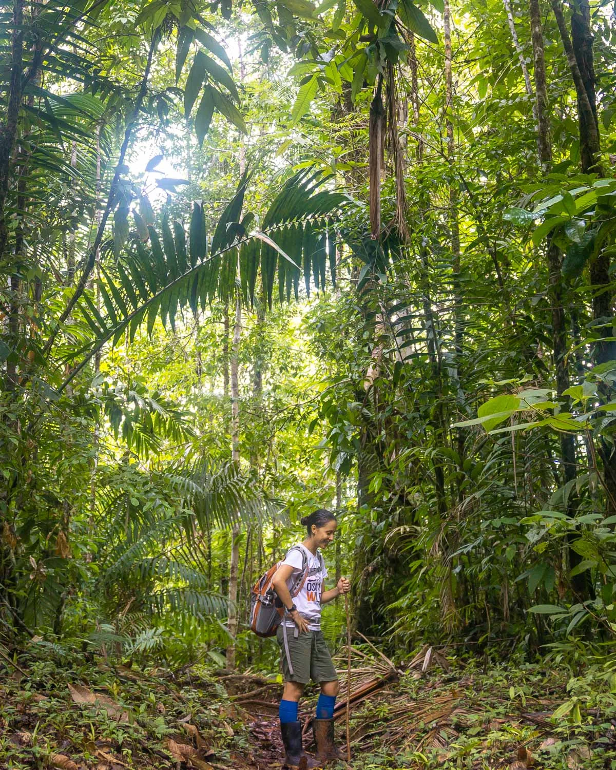 Our guide wearing a light backpack, jungle boots and zip off shorts