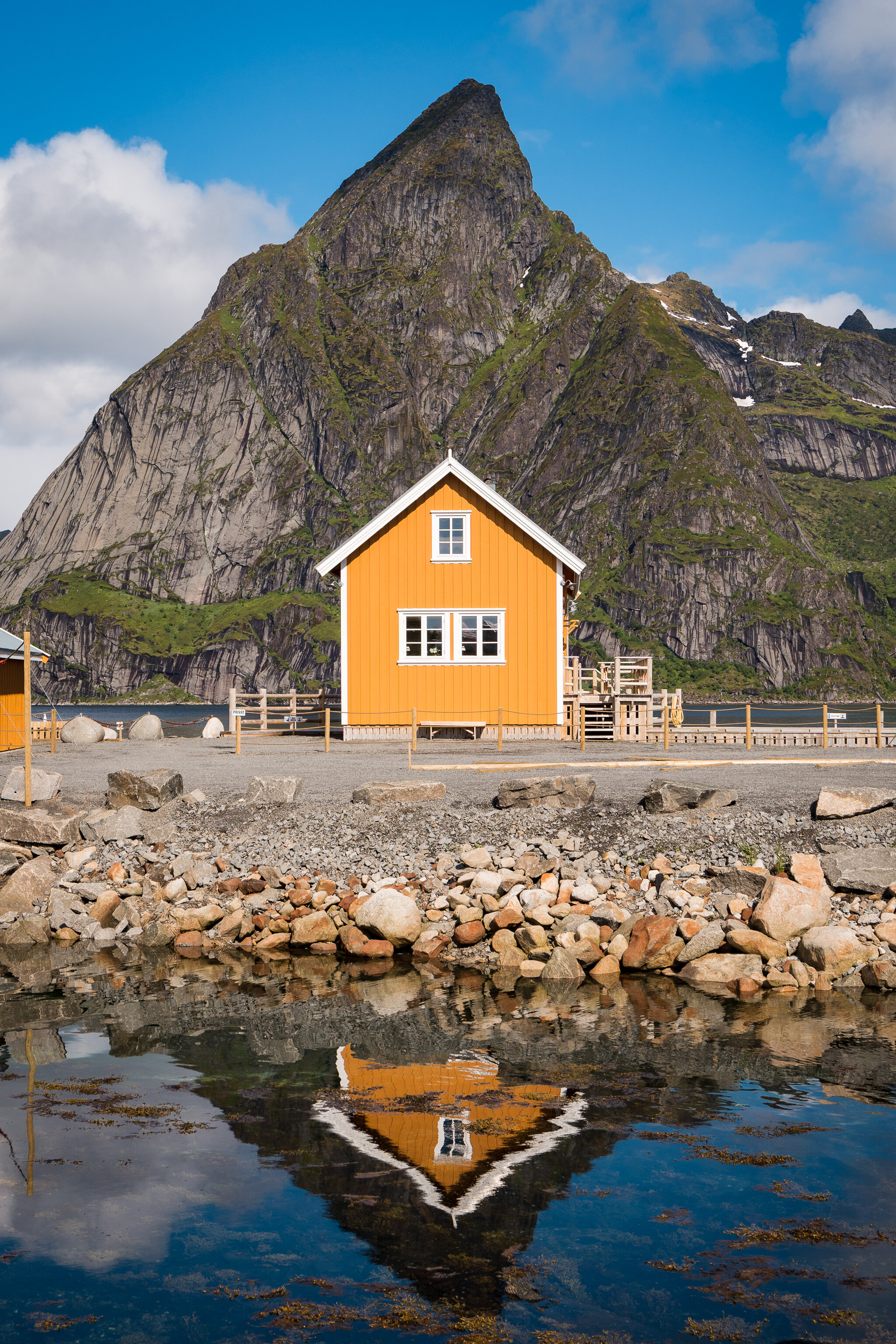 Iconic yellow fishing hut in Sakrisoy