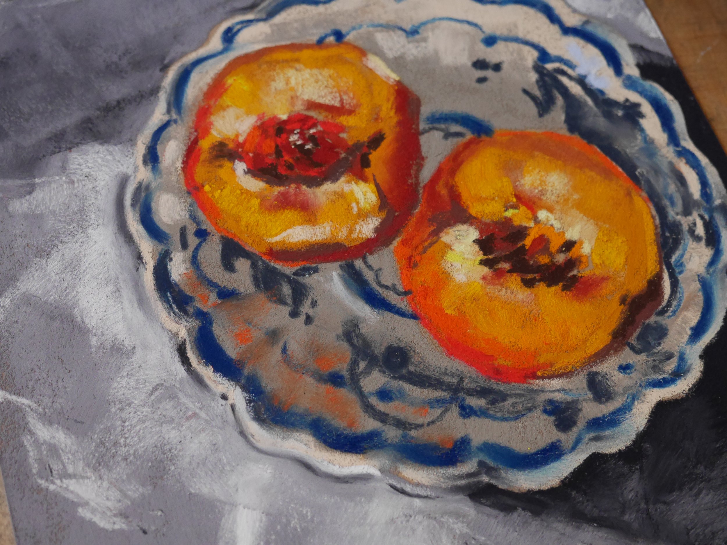 peaches on a white and blue plate in impressionistic style