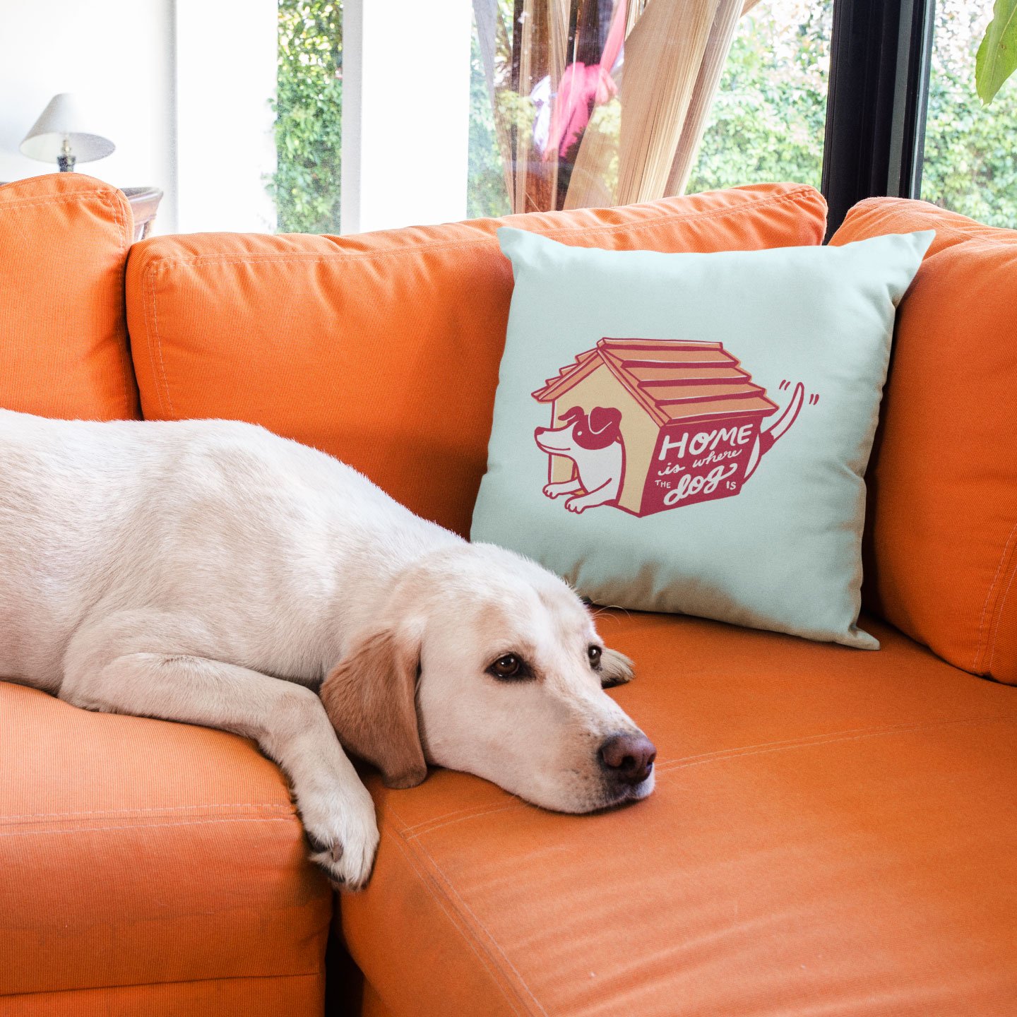 pillow-mockup-on-an-orange-sofa-near-a-labrador-dog-a14927.jpg