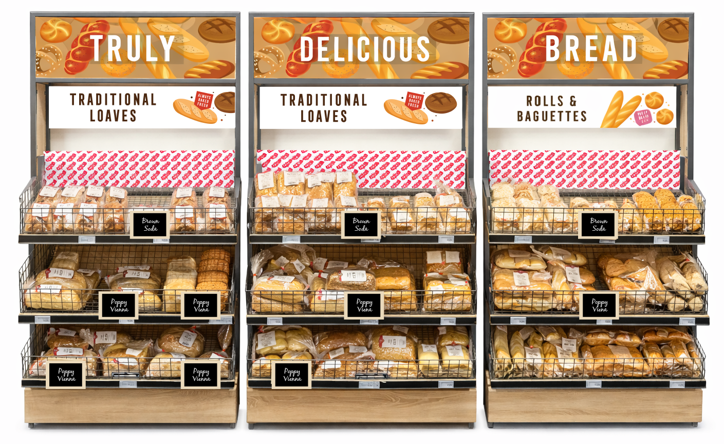 Bakery display with breads and baked goods, labeled as traditional loaves, rolls, and baguettes, with signs saying 'Truly Delicious Bread' and images of bread and baked items on top.