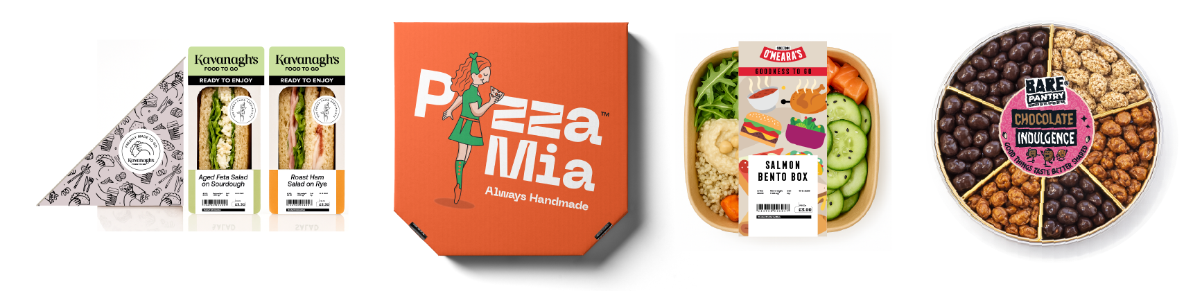 Assorted snack and meal boxes, including sandwiches, a pizza box, a salmon bento box, and a round container of mixed chocolates and nuts.