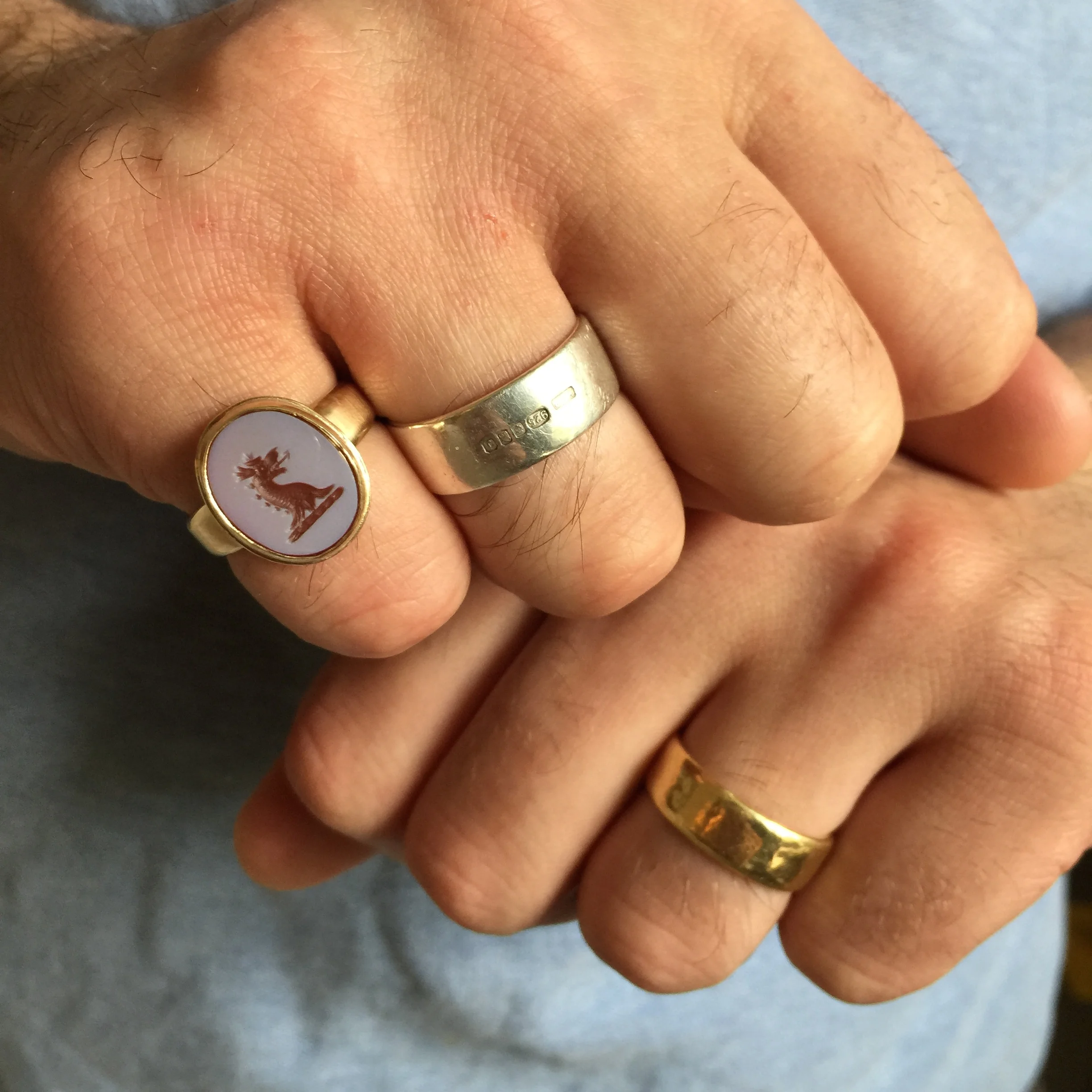 My husband's rings, with his new addition! I also made the other two... his 18ct yellow gold wedding band from 2012, and the silver band with feature hallmark was a gift for our 2nd year dating anniversary in 2004.