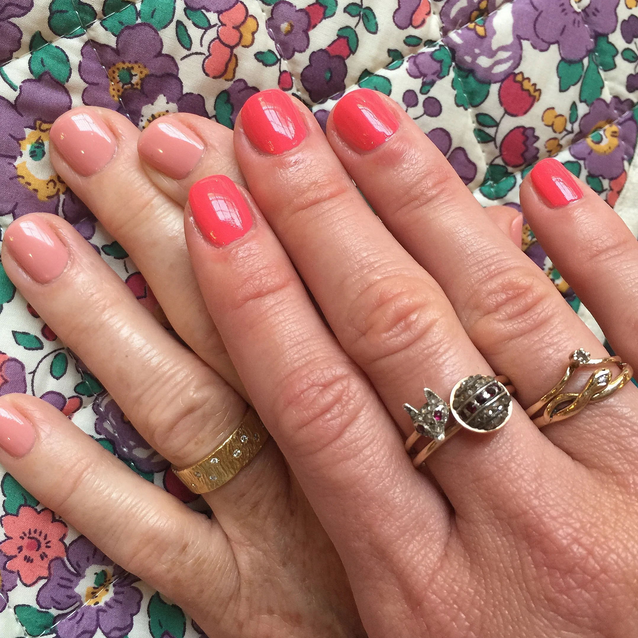 I made my mum's wedding ring too...it's 18ct yellow gold and set with 21 diamonds, you can see a bigger picture in our website's bespoke rings gallery.