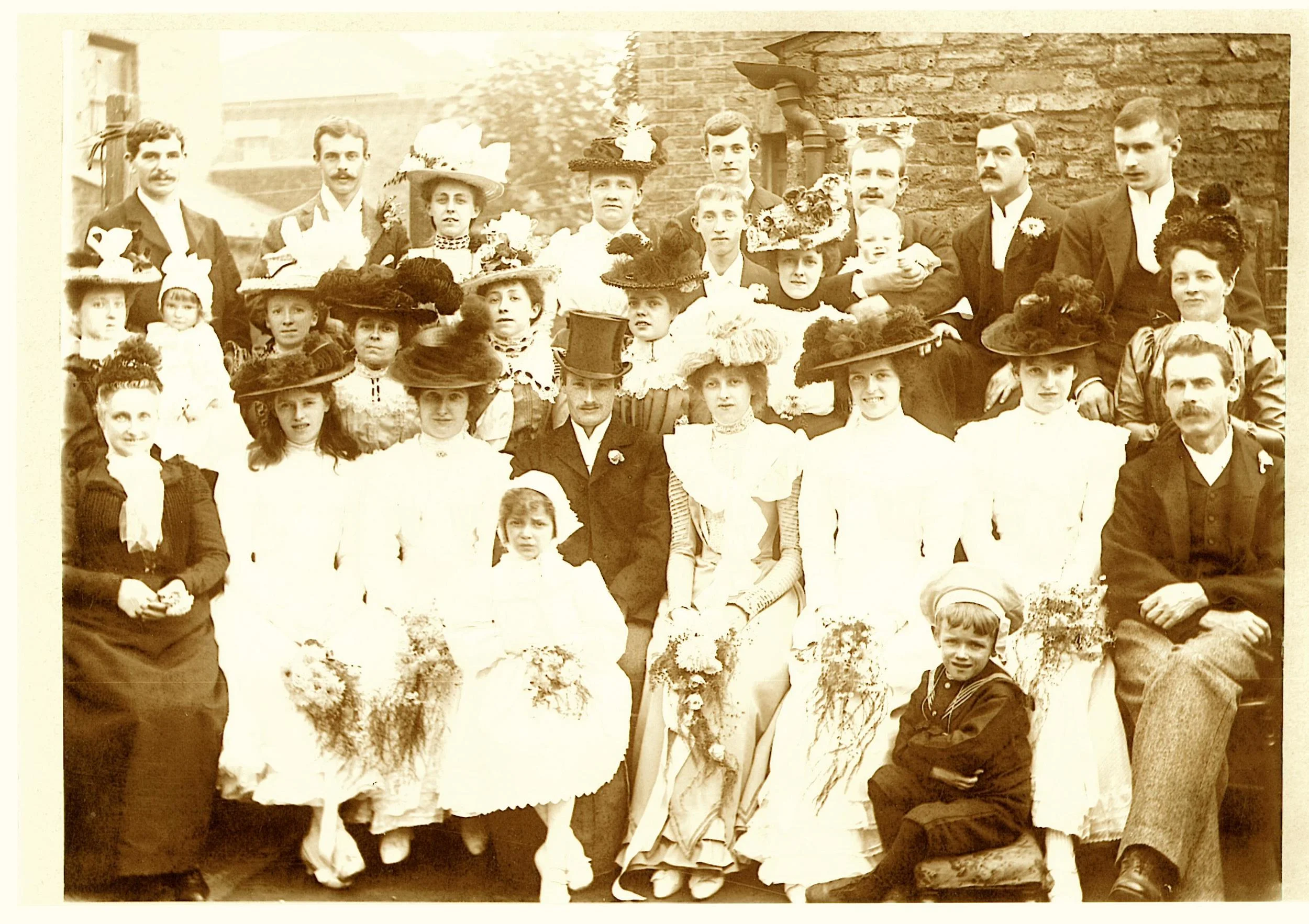 James is sitting on front row on the far right, and standing behind him is his wife Emma. The bride is my great grandma, James' daughter Emma Evans Threlkeld, and the groom is my great grandpa, John Way. I love the rakish angle of his hat! This photograph was taken on 15th September 1901. In two days' time it will be their 144th wedding anniversary.