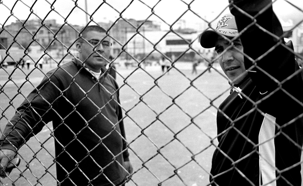 This is Itun and Jorge on the football court in Candelaria la Nueva. This is where they had their first shoot out against the military when they were about 17 and 15. This combat converted them both into prominent gang leaders. At the time, they, and several friends, had been hanging out on the football court when the soldiers started shooting at them. The only well trained shooter out of all of them was Itun, who shot back at the military while the others fled to their secret hideout for safety. 