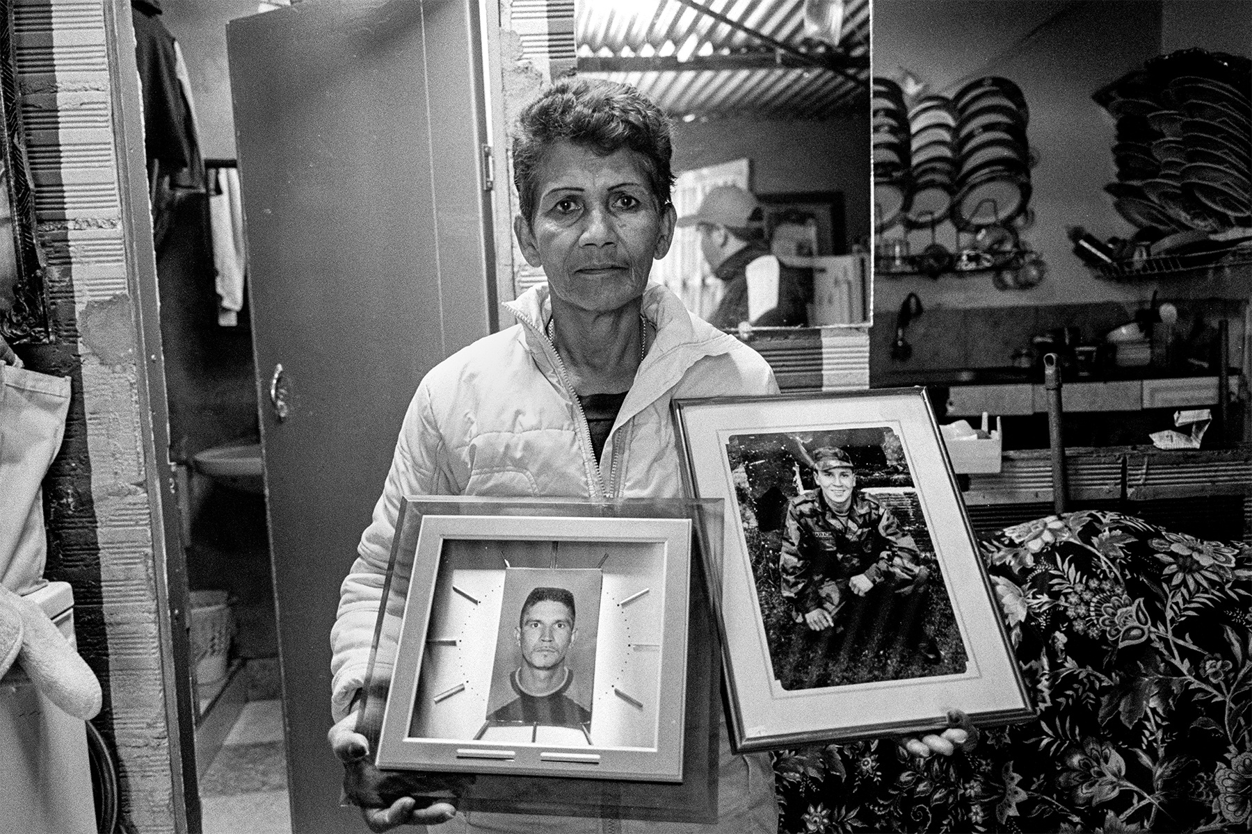 Nieve lost both her sons to the violence in the barrios. 3 years ago, one of her sons, Javier was stabbed to death a block away from home one night for a 5 dollar dept. Vladimir was also killed in the neighboorhood